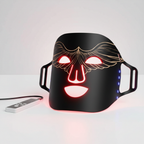 Veluné Aura LED Skin Renewal Mask on white surface with glowing LED light