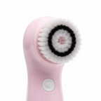 Close-up of Veluné Aura Sonic Facial Cleanser silicone bristles and design